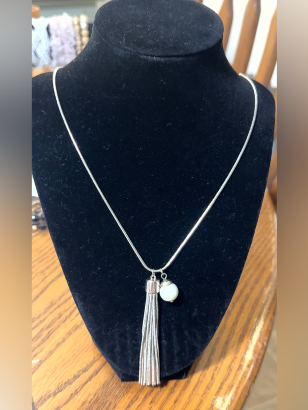 White House Black Market Silver Tassel Necklace with White Charm